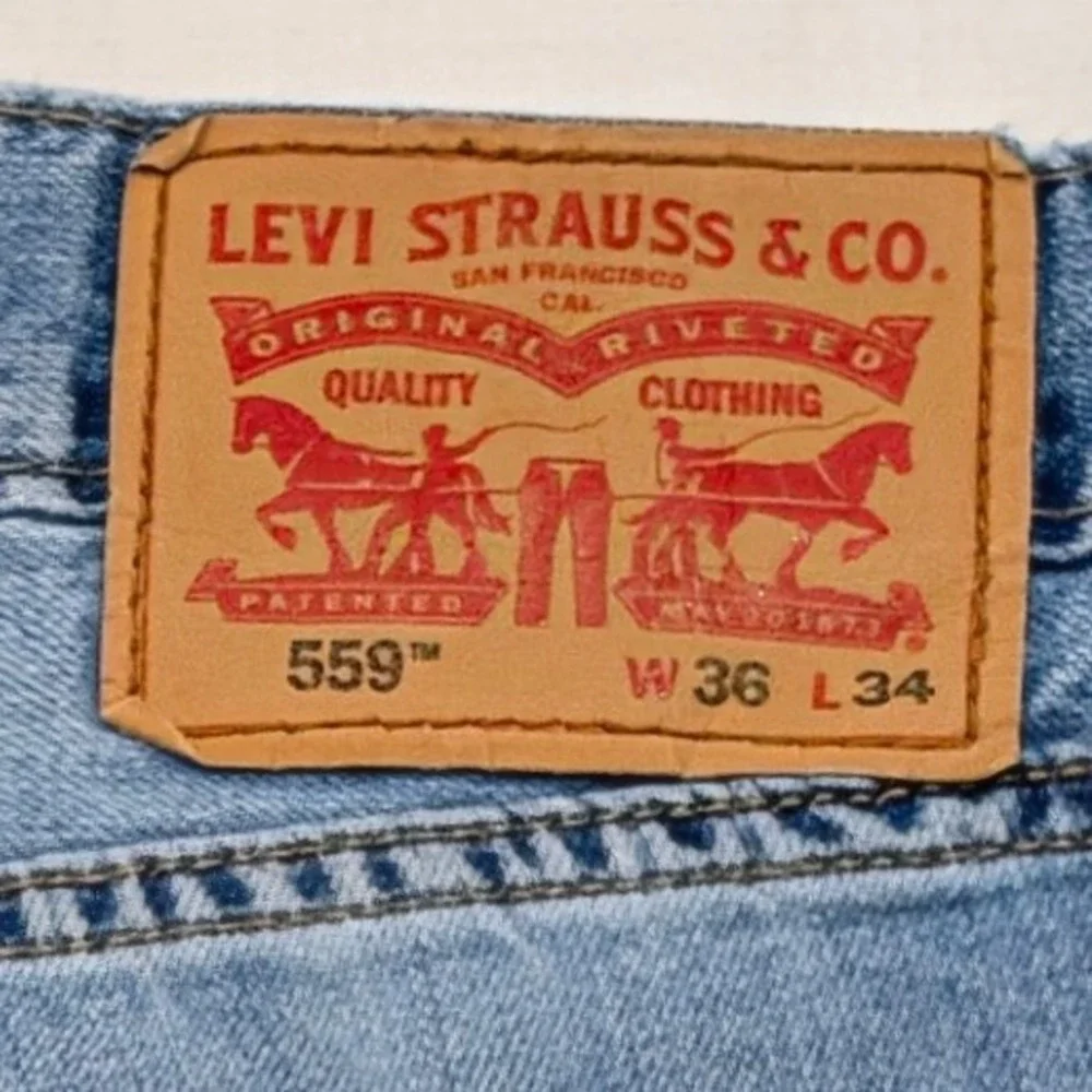 Levi's 559 Relaxed Straight Jeans Mens 36x34 Light Wash Blue Denim